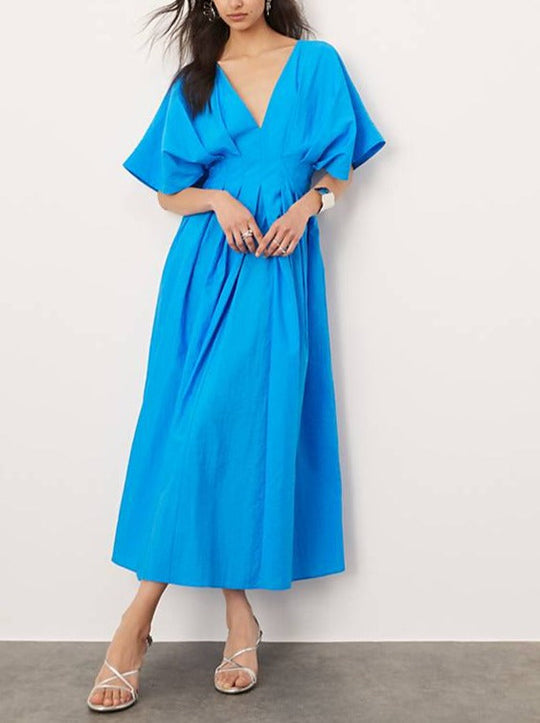 Weites Midikleid mit Puffärmeln | Plissee