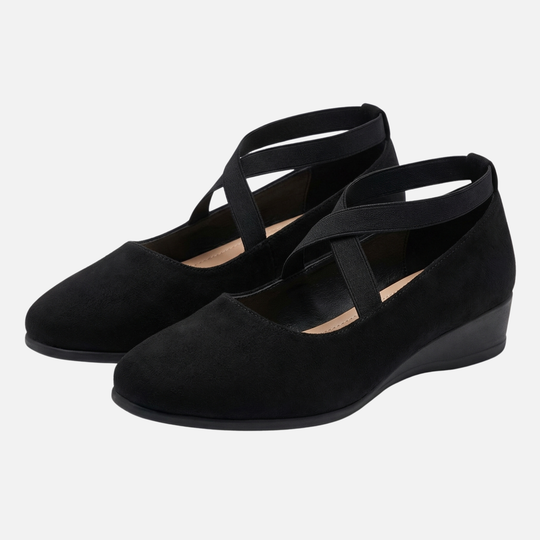 Damenschuhe mit Keilabsatz und geschlossener Spitze